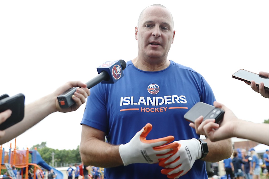 Islanders general manager Mathieu Darche talks with media while he and team staff were constructing a playground at a Bellerose YMCA with the Islanders Children’s Foundation on Sept. 2, 2026.