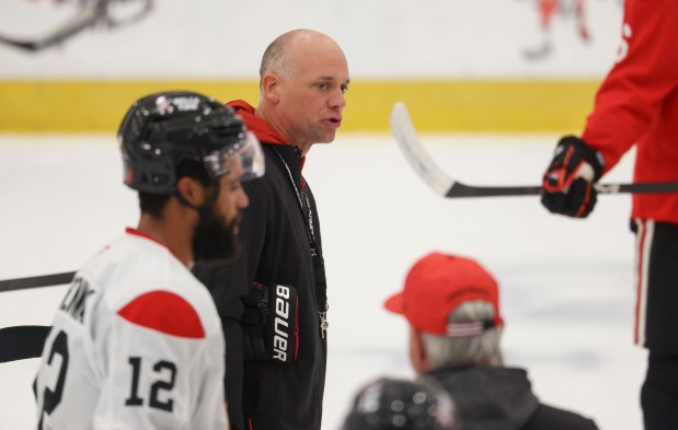 Head coach Jeff Blashill talks to players during practice Thursday, Sept. 17, 2026, during training camp at the Blackhawks Ice Center. (Brian Cassella/Chicago Tribune)