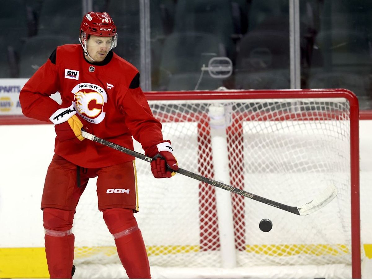 After earning last Flames' roster spot, what can Brennan Othmann be?