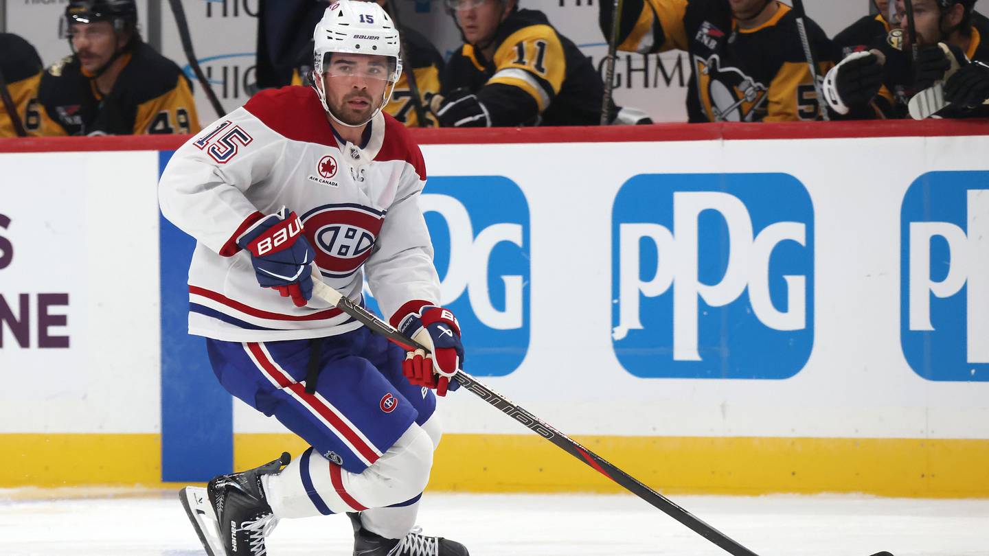 Montreal Canadiens center Alex Newhook (15) skates with the puck against the Pittsburgh Penguins during the third period at PPG Paints Arena.  Mandatory Credit: Charles LeClaire-Imagn Images