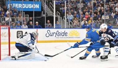 Oct 20, 2026; St. Louis, Missouri, USA;  Winnipeg Jets goaltender Stuart Skinner (74) and defenseman Neal Pionk (4) defend against St. Louis Blues defenseman Philip Broberg (6) during the second period at Enterprise Center.  Mandatory Credit: Jeff Le-Imagn Images