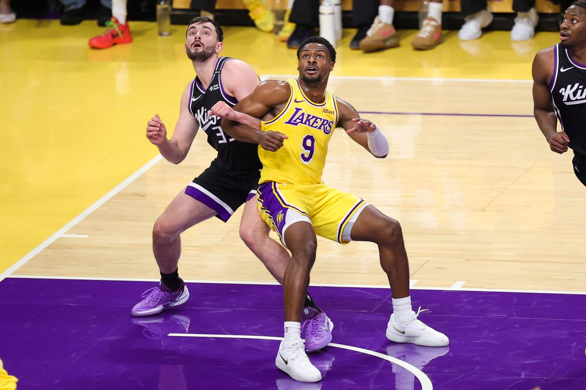 Los Angeles Lakers G Bronny James (9) boxes out for a rebound during an NBA basketball game against the Sacramento Kings, Thursday October 8, 2026 in Los Angeles, Calif.