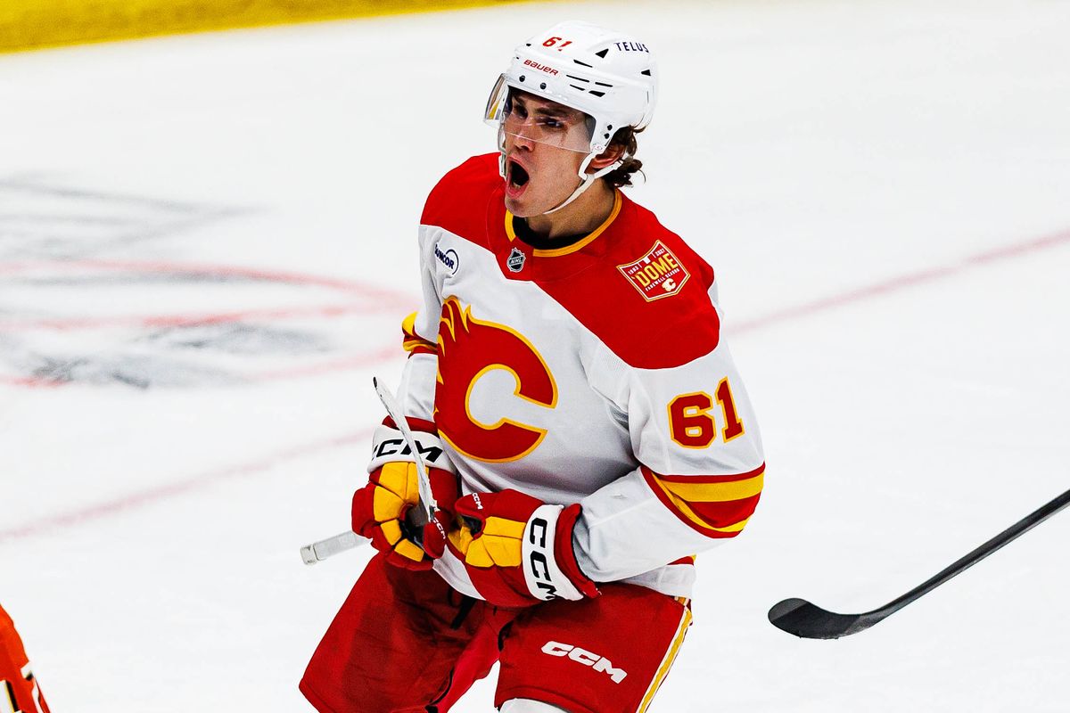 Aydar Suniev #61 of the Calgary Flames celebrates after scoring a goal during an NHL game against the Anaheim Ducks on October 13, 2026 at Honda Center in Anaheim, California. Aydar Suniev #61 of the Calgary Flames celebrates after scoring a goal during an NHL game against the Anaheim Ducks on October 13, 2026 at Honda Center in Anaheim, California.