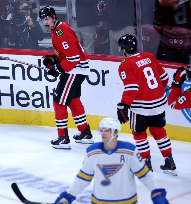 Chicago Blackhawks defenseman Sam Rinzel (6) celebrates after scoring a goal in the second period of the home opener against the St. Louis Blues at the United Center in Chicago on Oct. 6, 2026. (Chris Sweda/Chicago Tribune)