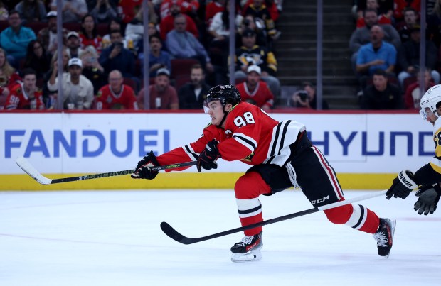 Chicago Blackhawks center Connor Bedard (98) takes a shot on goal in the first period of a game against the Pittsburgh Penguins at the United Center in Chicago on Oct. 13, 2026. (Chris Sweda/Chicago Tribune)