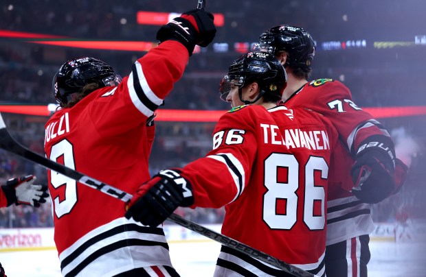 Chicago Blackhawks center Teuvo Teravainen (86) celebrates with his teammates after scoring a goal in the first period of a game against the Pittsburgh Penguins at the United Center in Chicago on Oct. 13, 2026. (Chris Sweda/Chicago Tribune)