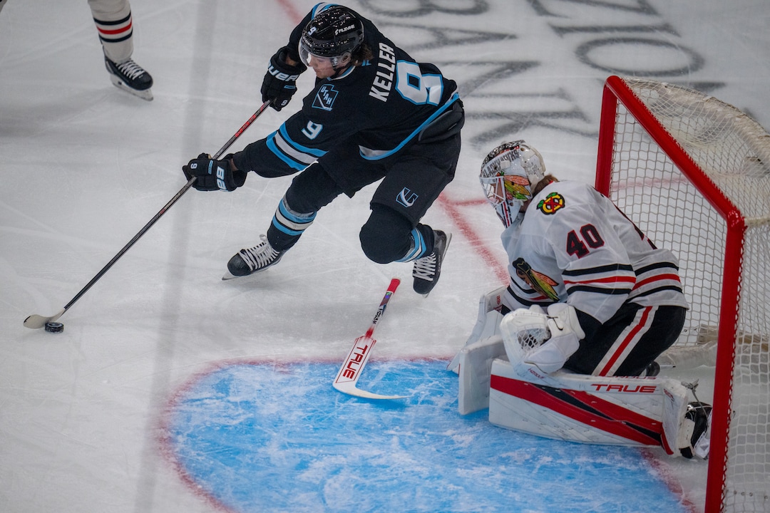 (Trent Nelson | The Salt Lake Tribune) Utah Mammoth right wing Clayton Keller (9) and Chicago Blackhawks goaltender Arvid Soderblom (40) as the Utah Mammoth host the Chicago Blackhawks, NHL hockey in Salt Lake City on Thursday, Oct. 1, 2026.
