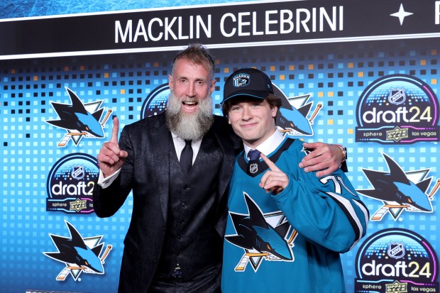 Joe Thornton, left, poses for a photo with Macklin Celebrini after being selected by the the San Jose Sharks with the first overall pick during the first round of the 2024 Upper Deck NHL Draft at Sphere on June 28, 2024 in Las Vegas, Nevada. (Photo by Ethan Miller/Getty Images)