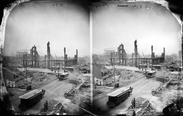 Gutted buildings and smoldering rubble are at State and Madison streets after the Great Chicago Fire in 1871. (Chicago Tribune archive) 