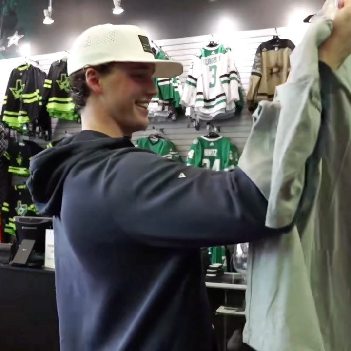 Jake Oettinger checks out the Jake Otter shirt for the first time!  ...
