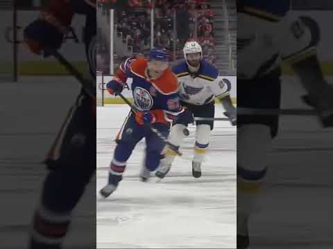 McDavid carries the puck into the zone McDavid-style