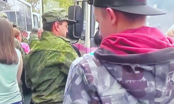 Just watching some video of Russian conscripts saying goodbye to their families when a wild pinwheel appears...