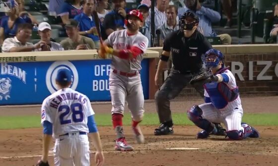 A man of the people! Joey Votto fist bumps a young Cubs fan and then homers!