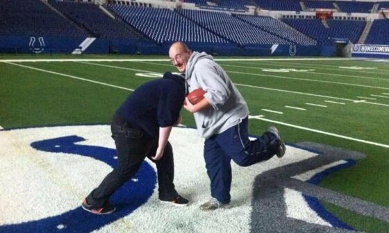 My dad passed away a couple days ago. We hadn't spoken in a few years and ended on a poor note, but it still hurts losing a parent. Wanted to share a picture of us on the field at Lucas Oil years ago.