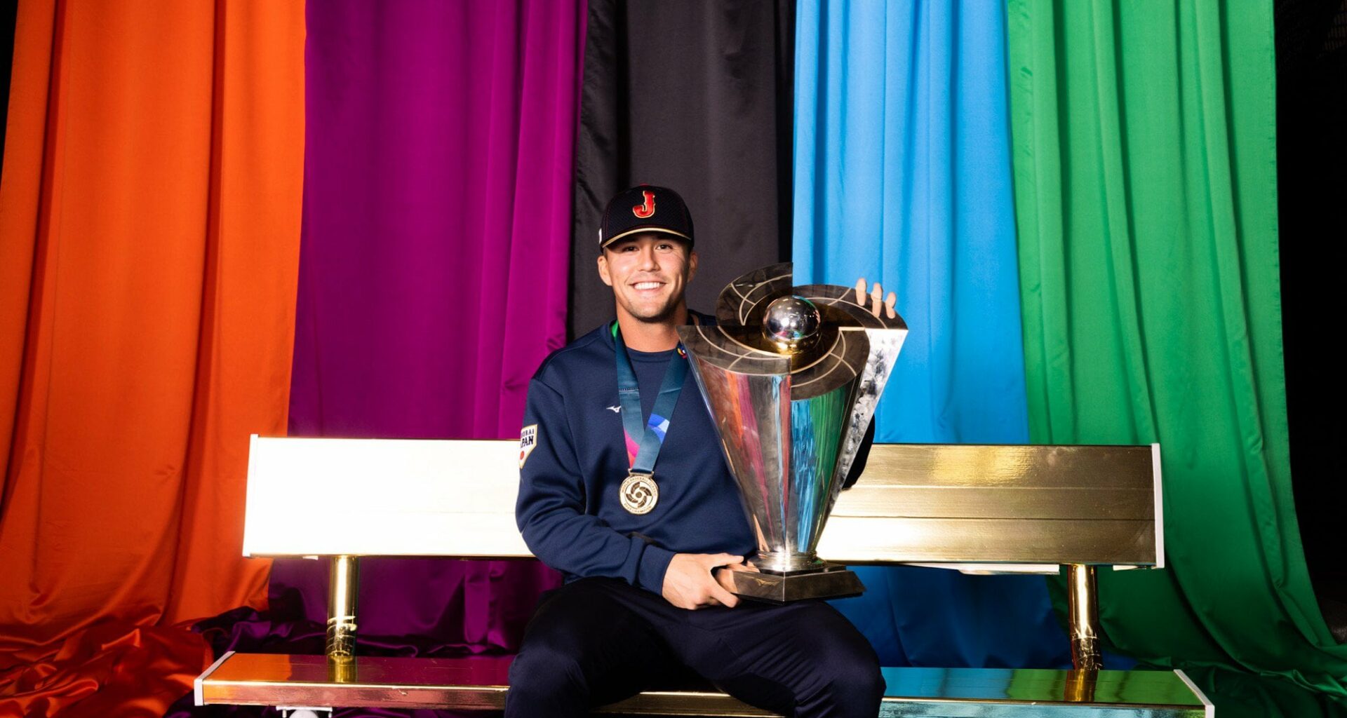 Lars Nootbaar with the World Baseball Classic Trophy
