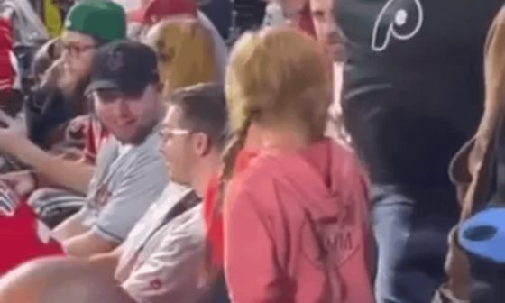 Kid steals random guys baseball and parents force her to throw it on the field