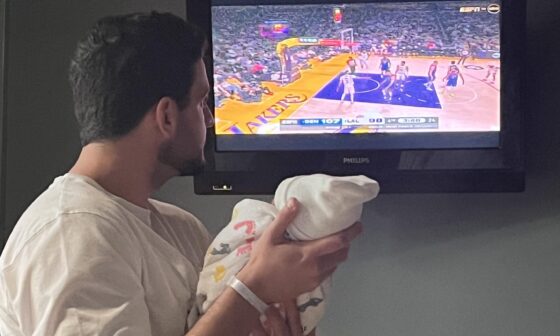 Six hours old. First life lesson, we always root against the Lakers!