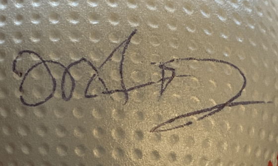 Whose autograph is this? Someone in my kid's class gave it to him, said it's one of the Nats but we don't know who. I can't read it or even tell which way is up. Anyone know?
