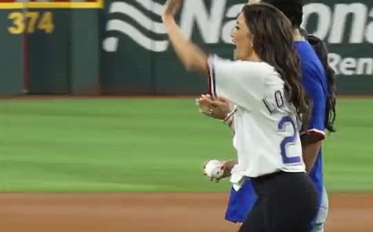 Eva Longoria threw out the first pitch tonight at the Rangers game