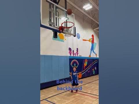 Behind the backboard