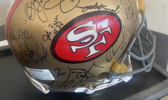 1 of a kind signed helmet from my dad. Help me price it? Please?