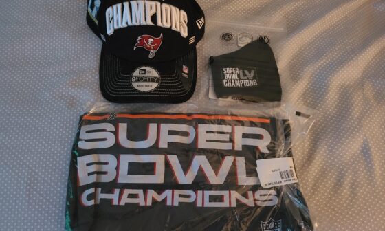 Did anyone else buy extra Super Bowl gear back when it was on clearance just to have an unopened set like I did? :D