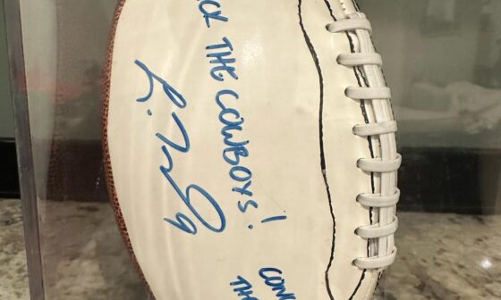Autographed football that I got as a wedding gift from my sister years ago, signed by Tynes and Landeta
