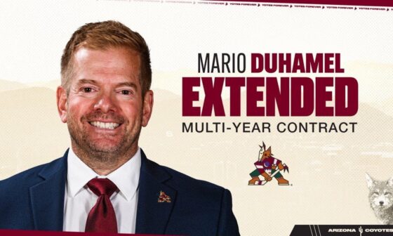Assistant Coach Mario Duhamel extended