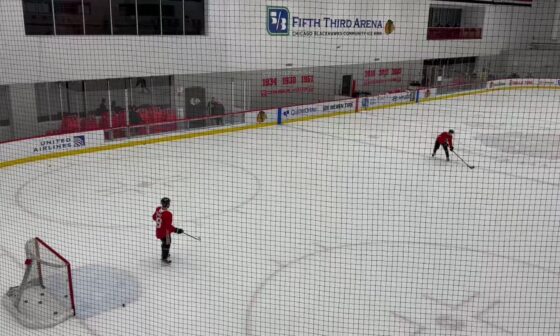[Ben Pope] Blackhawks practice ended a while ago but Connor Bedard and Kevin Korchinski are still on the ice together, practicing tipping point shots:
