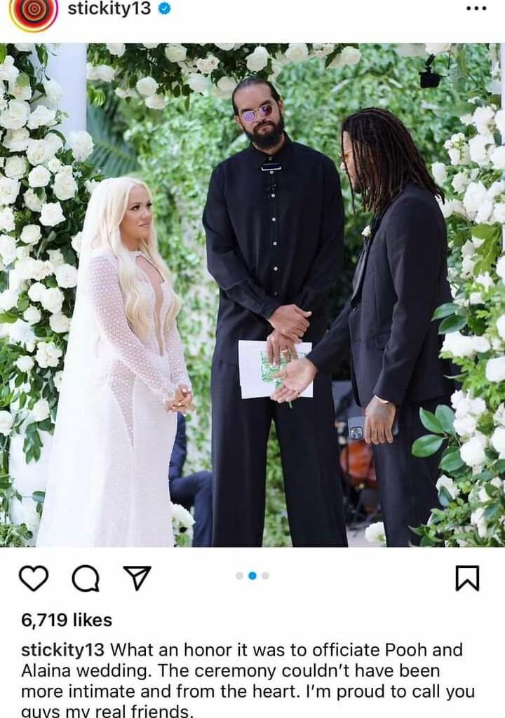 Father Noah officiating Rose's wedding