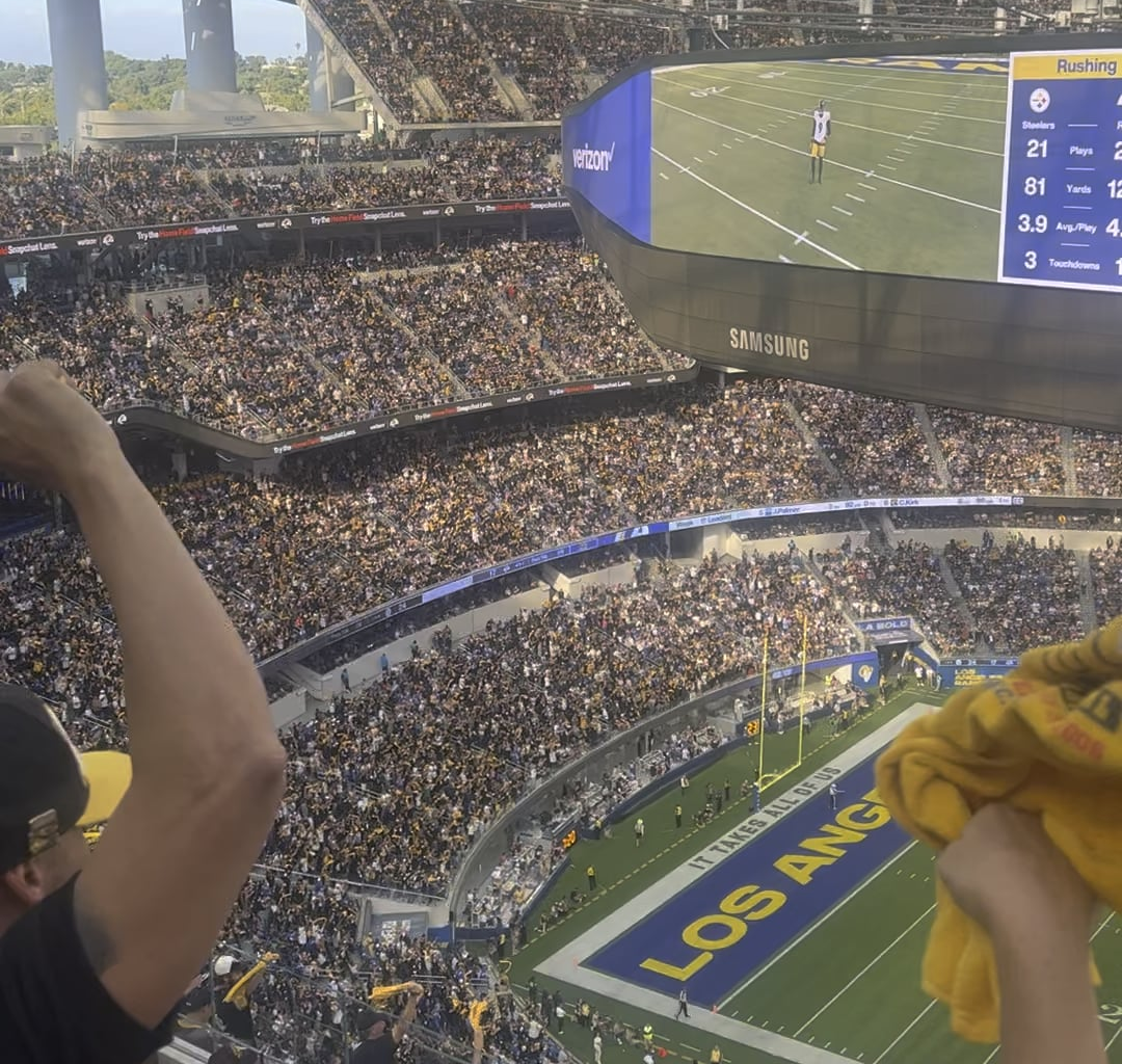 I feel bad for the Jumbotron operator for having to try and find Rams fans in this crowd.