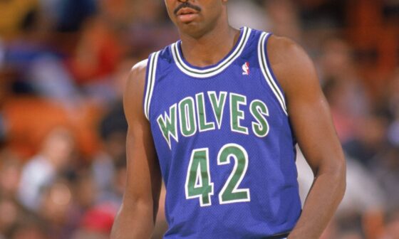 Should the Wolves rebrand back to the OG blue and green?