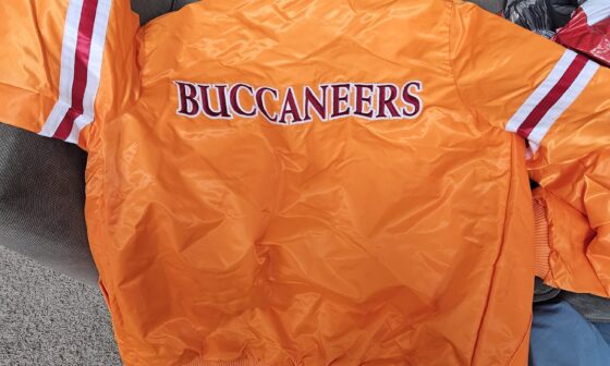 Buddy sent me a creamsicle Starter jacket! I am thrilled, but my wife won't look at me 🤣