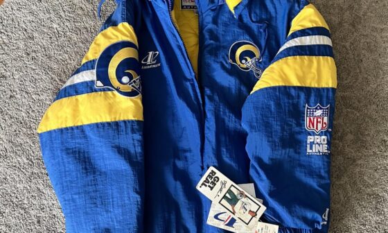 My Uncle passed away in 2002 and he is the reason I grew up a Rams fan in the Bay Area. He was fortunate enough to witness our Super Bowl run in 2000. Not knowing when our next one would be, he bought tons of gear, many of them unworn. I recently visited my Grandma’s house and snagged a few items.