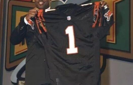 With the first pick of the 1999 NFL Draft, the Cincinnati Bengals select Akili Smith, quarterback, Oregon.