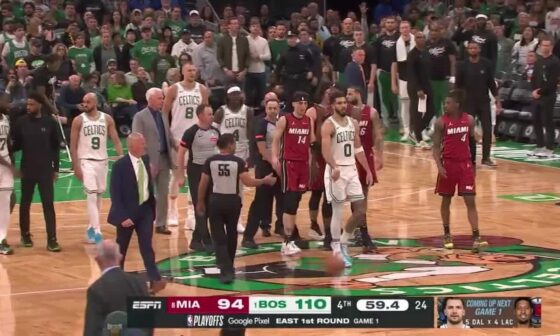 Tatum hits the deck after getting bodied by Caleb Martin