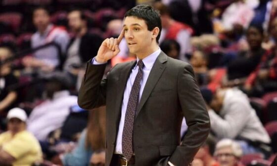 It looks weird seeing a picture of young Coach D coaching in a suit...
