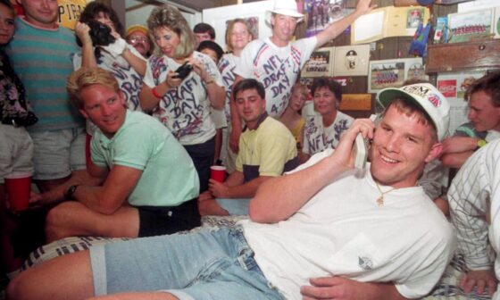Who is the Pirates player on the poster on the wall in this famous Brett Favre draft photo?