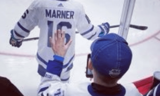 Photo of a young Easton Cowan at a Leafs game