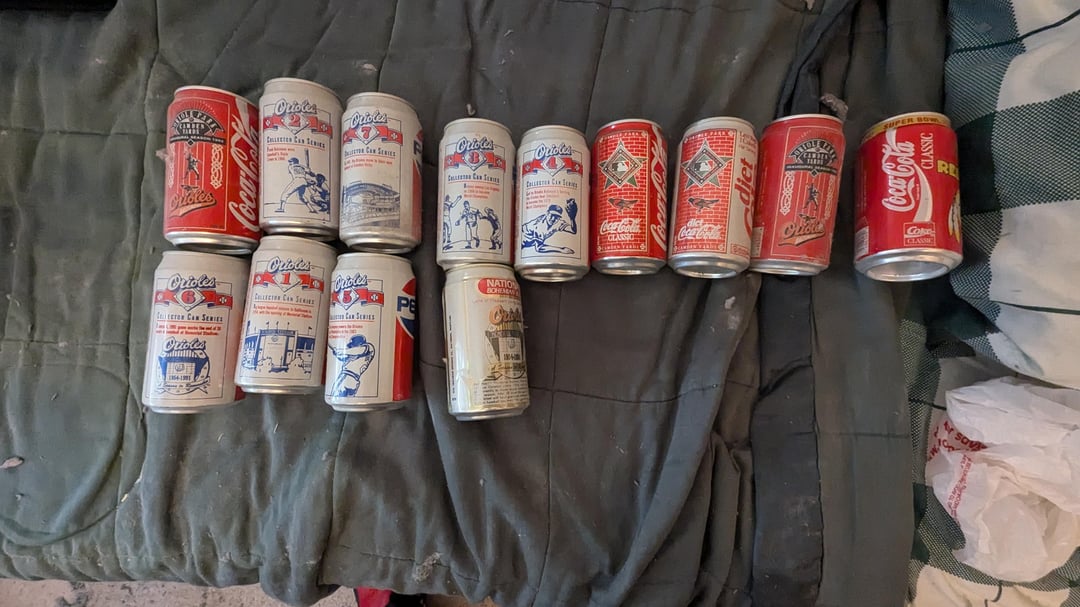 Purchasing a house today and found these commemorative cans from the early '90s