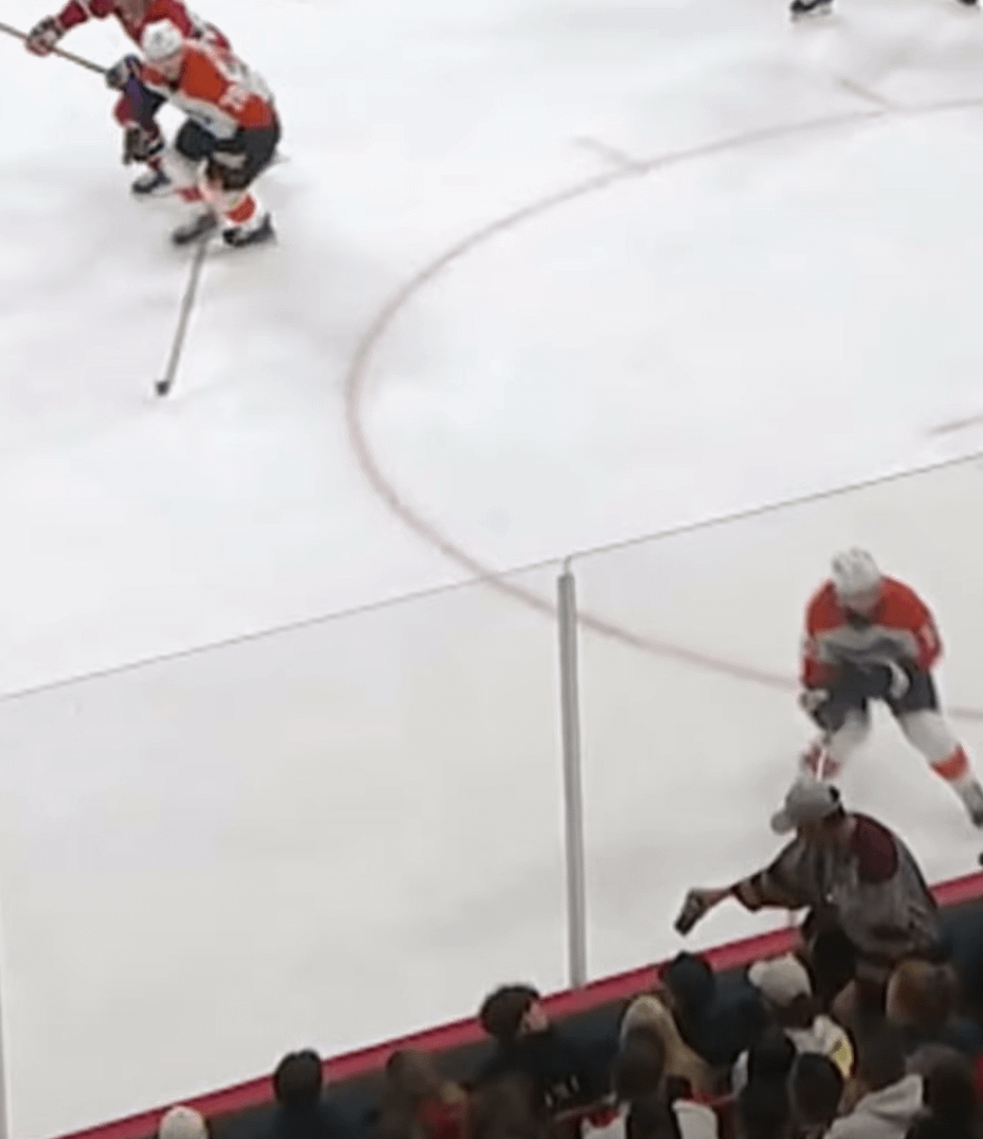 Crowd reacts to Patrick Laine touching the puck