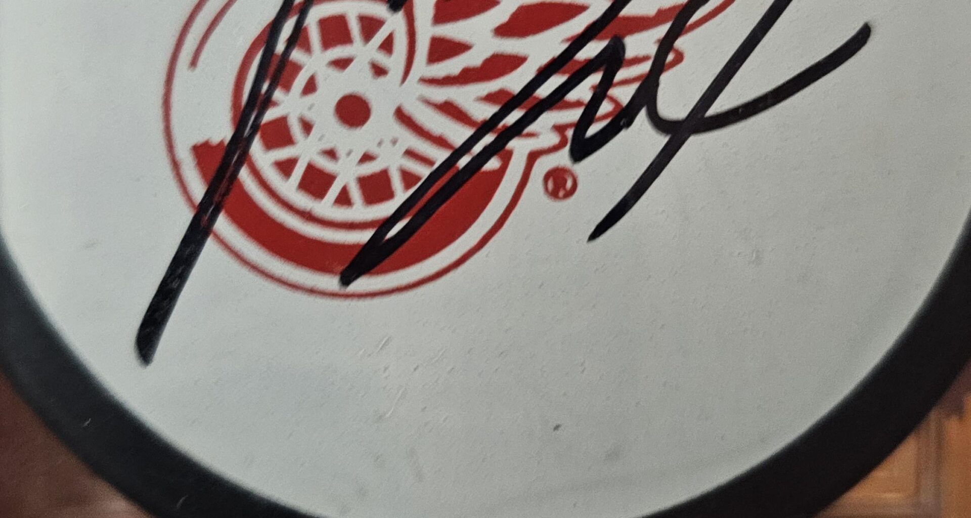 Help identifying a signed puck!