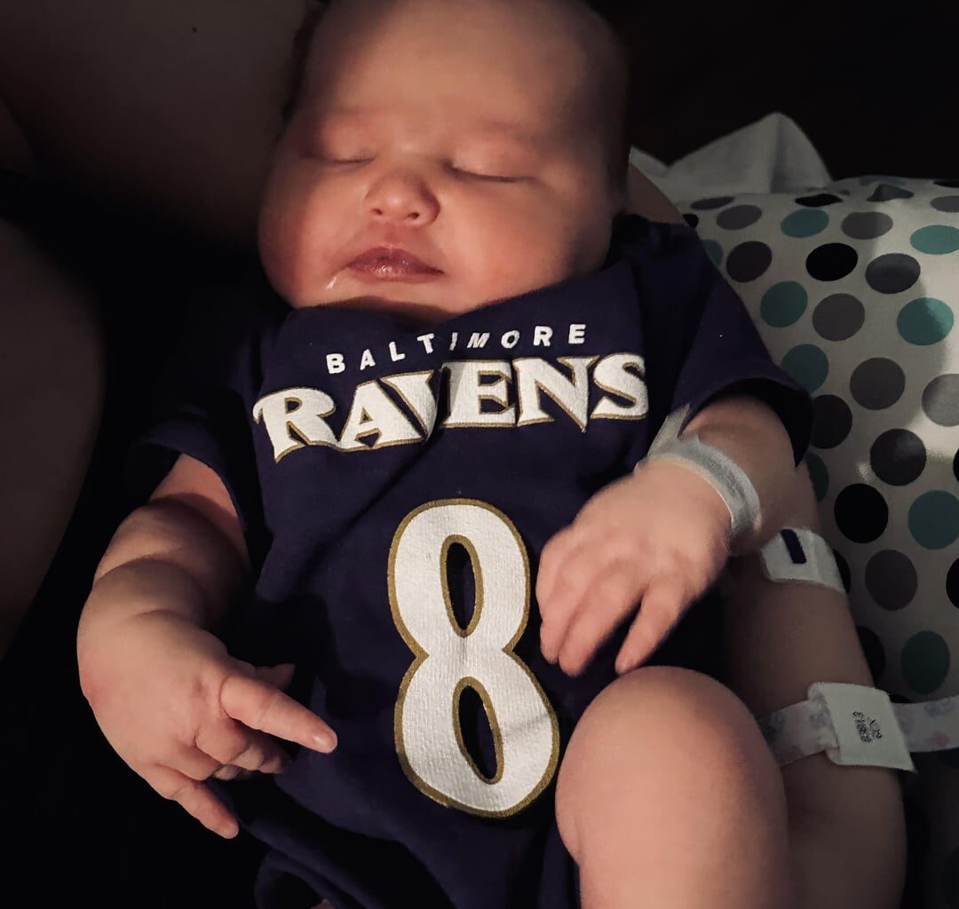 In the hospital with my 1 day old baby girl and she's already a fan😎