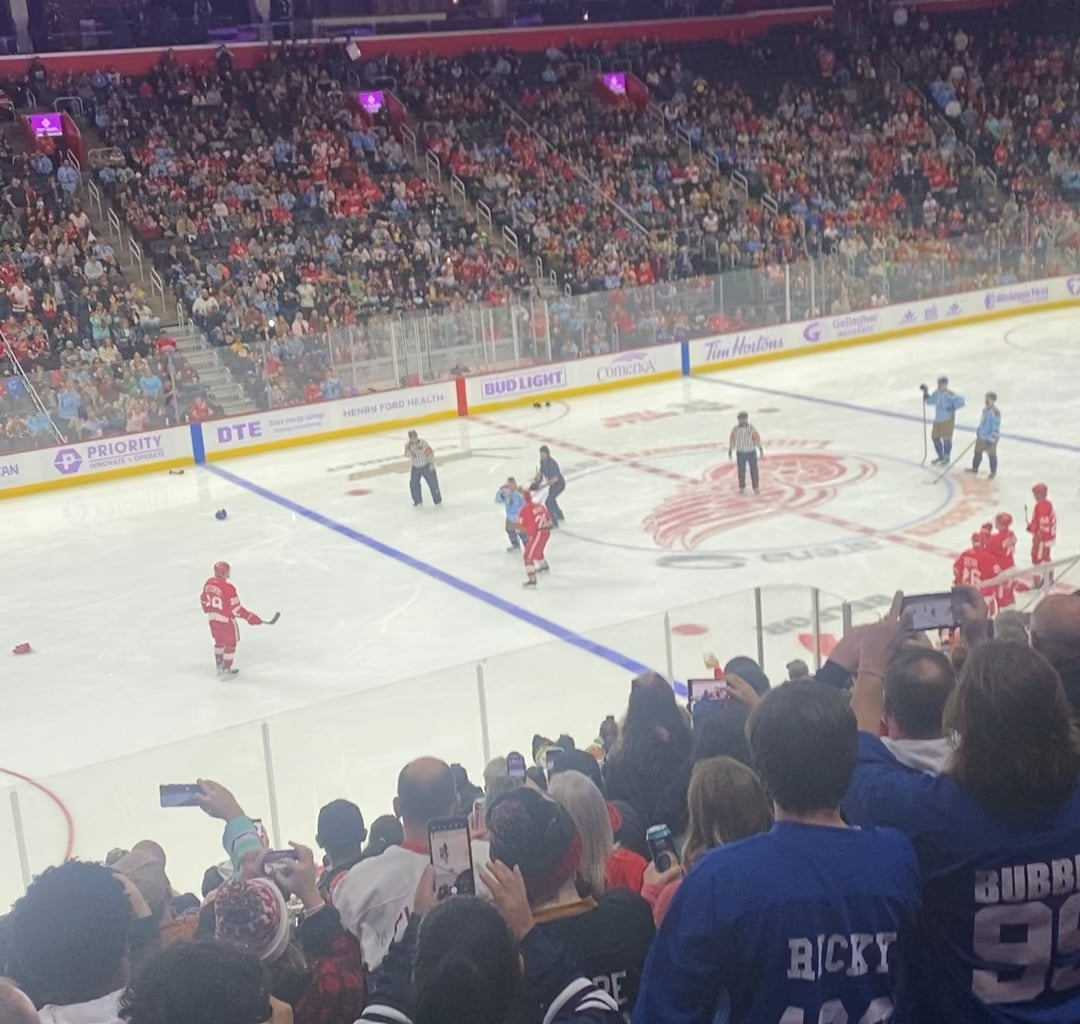 McCarty “fights” Jim at Alumni game