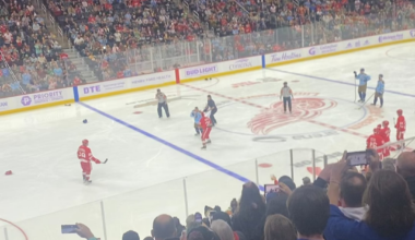 McCarty “fights” Jim at Alumni game