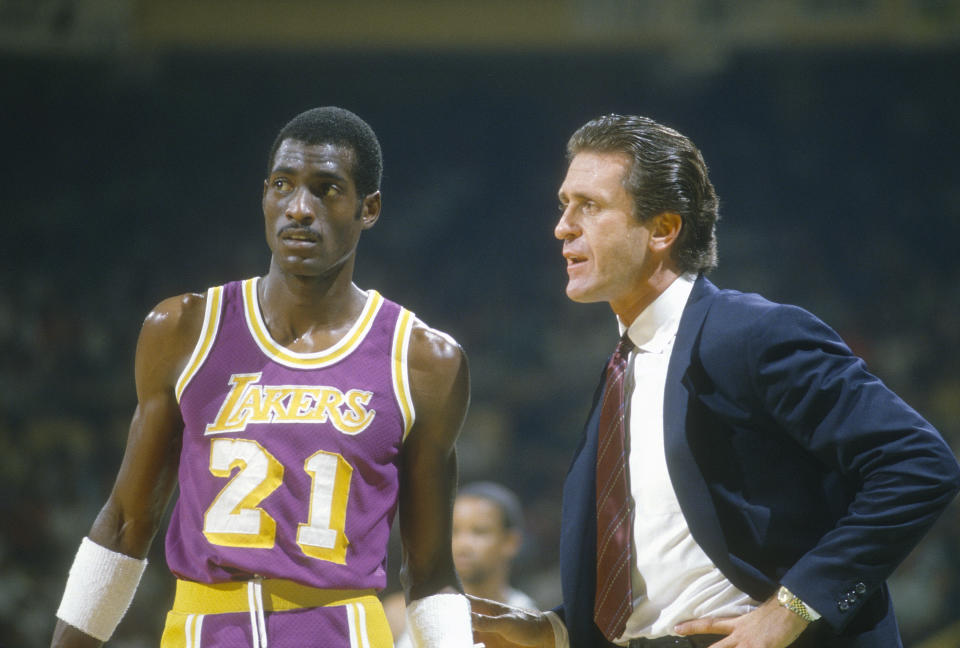 Pat Riley and Michael Cooper circa 1985. (Focus on Sport/Getty Images)