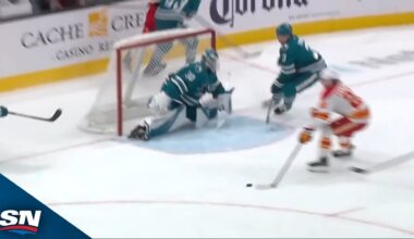 Sharks’ Yaroslav Askarov stuns Flames’ Jakob Pelletier with acrobatic stop