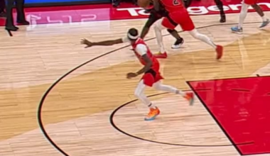 Tyler Herro launches a three from the logo