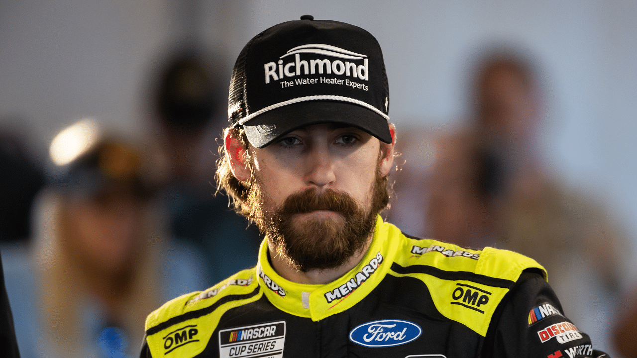 (L-R) NASCAR Cup Series driver Chase Bricoe with former team owner and driver Tony Stewart.