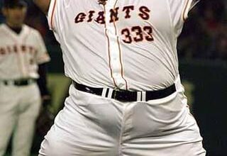 Weighing in at over 600 lbs (or approximately two William Howard Tafts), Hawaiian sumo wrestler Konishiki throws out the first pitch at the 1998 Super Dome All-Star Series in Tokyo
